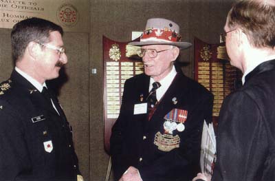 Brigadier - General E. S. Fitch in conversation with S/Sgt. (ret'd) R. B. Cathline, "Hall of Fame" Inductee!
